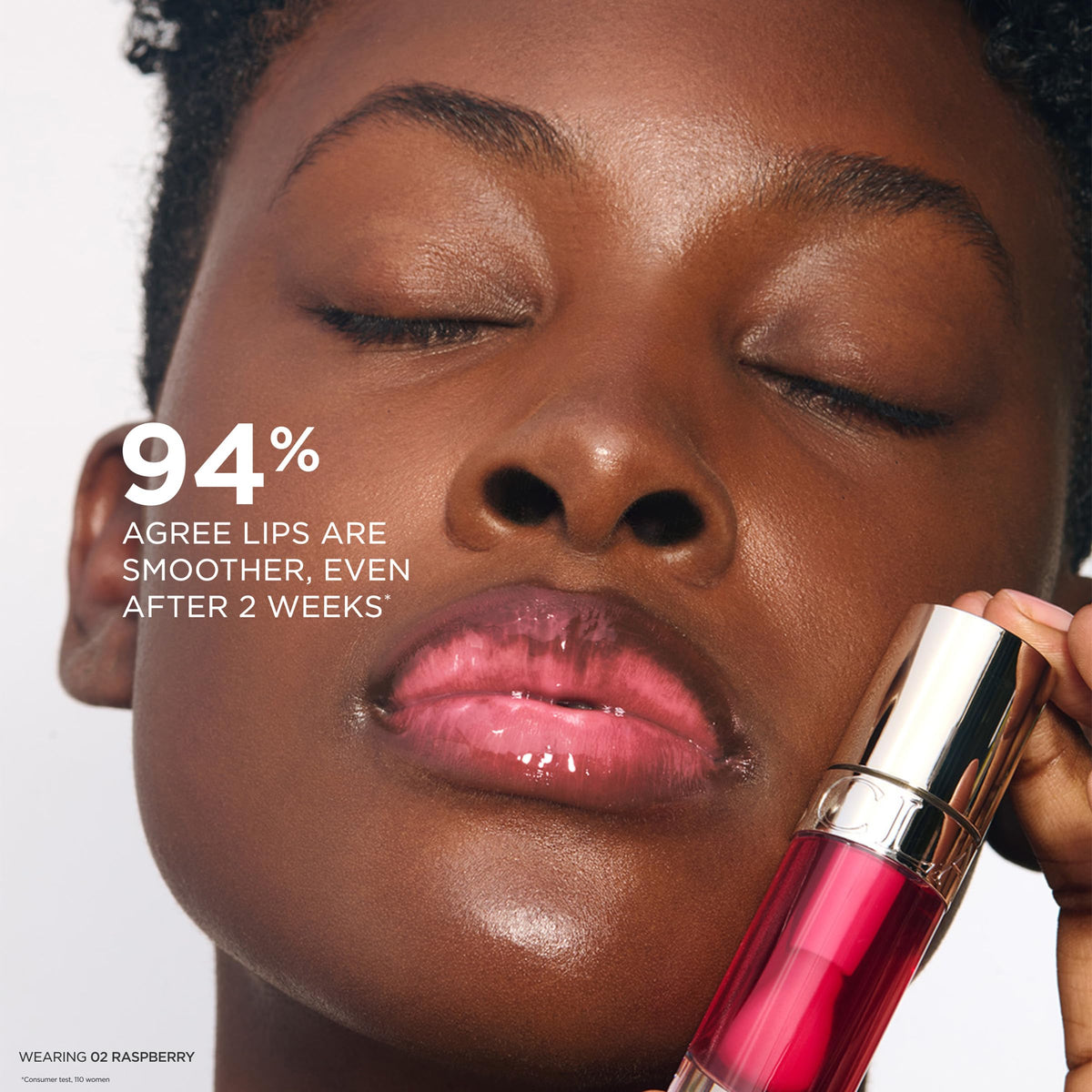 CLARINS Lip Comfort Oil lifestyle scene with makeup