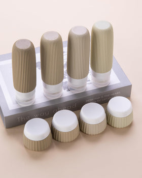 Clear makeup bag containing Mrsdry travel bottles