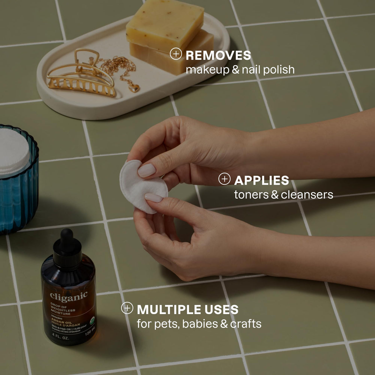 Cliganic cotton rounds being used for makeup removal