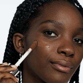 Clinique Beyond Perfecting Foundation + Concealer packaging with brand logo