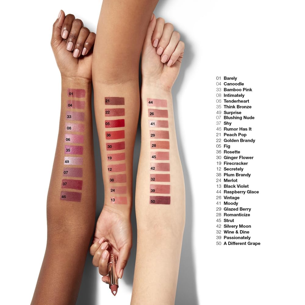 Clinique Dramatically Different Lipstick Glazed Berry with makeup accessories