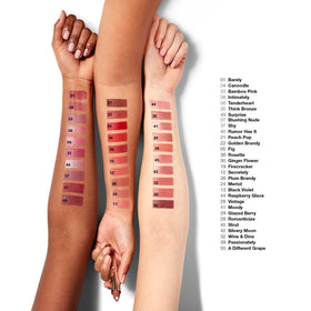 Clinique Dramatically Different Lipstick Glazed Berry with makeup accessories