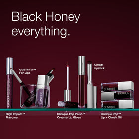 Clinique High Impact Mascara in a makeup setup with other products