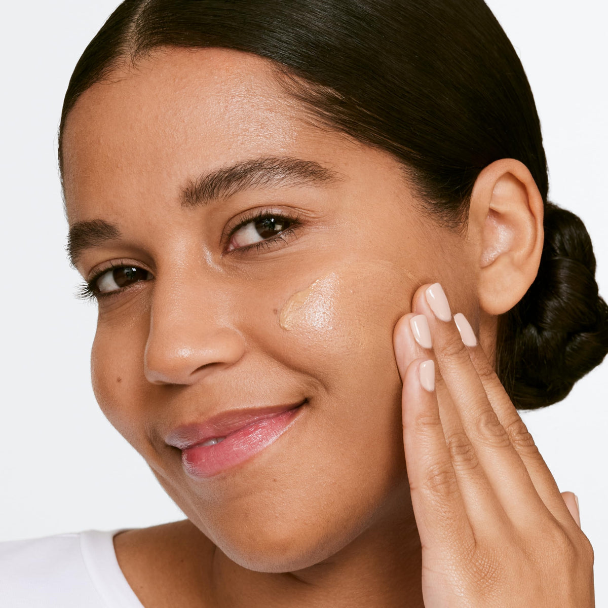 Clinique Moisture Surge Sheertint Hydrator application on model