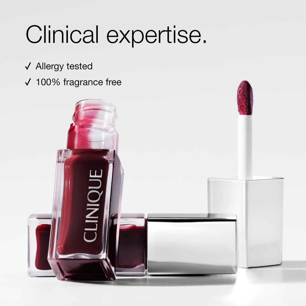Clinique Pop Lip + Cheek Tinted Oil Black Honey with makeup products