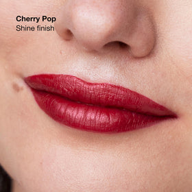 Clinique Pop Longwear Lipstick Cherry Pop swatch on skin