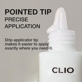 CLIO Glazing Milky Essence bottle on a bathroom counter