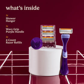 Close-up of 6 blade razor refill pack included