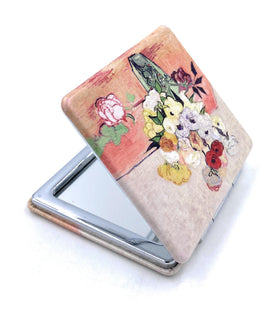 Close-up of Aeisage compact mirror design with roses and anemones