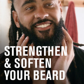 Close-up of Aged Bourbon beard oil bottle in gift set
