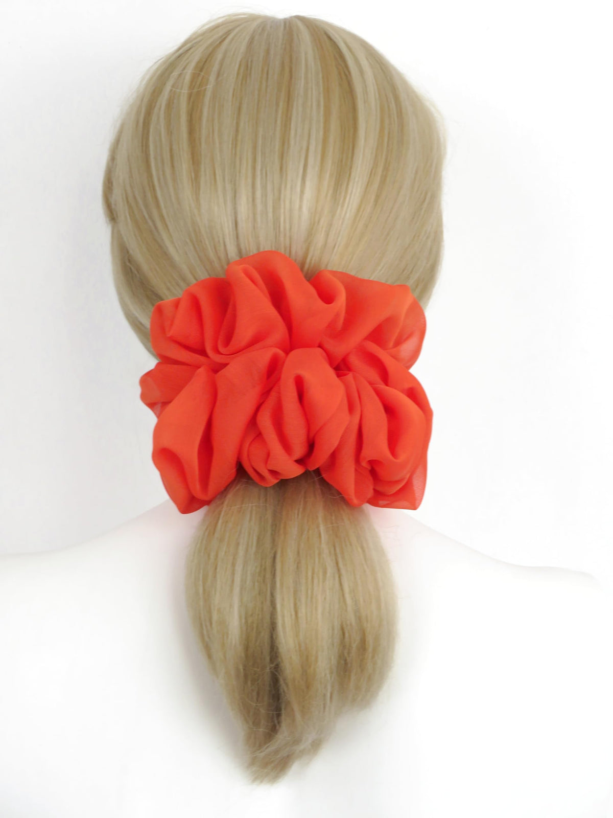 Close-up of AnnushkaHomeDecor scrunchie showing soft chiffon texture