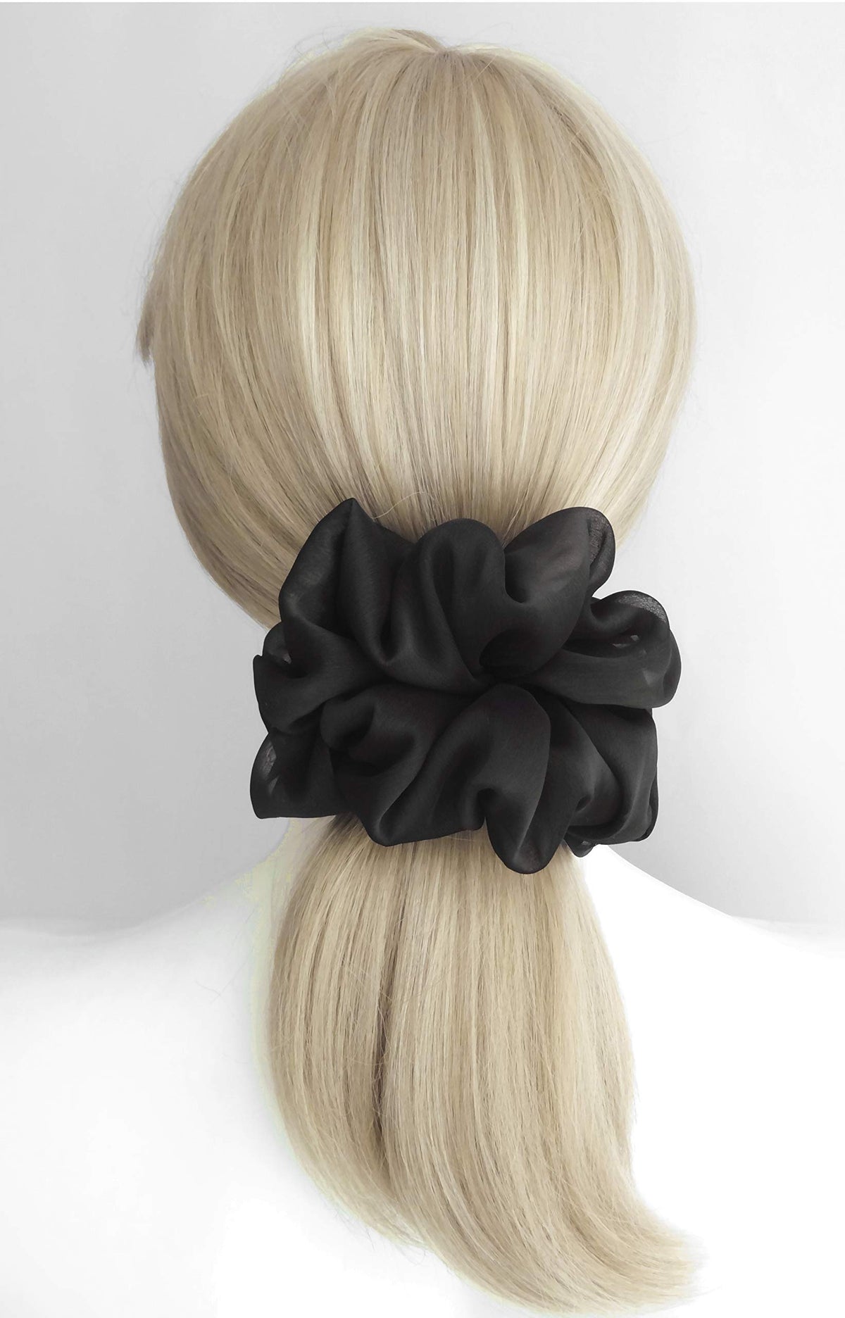 Close-up of AnnushkaHomeDecor scrunchie showing soft chiffon texture
