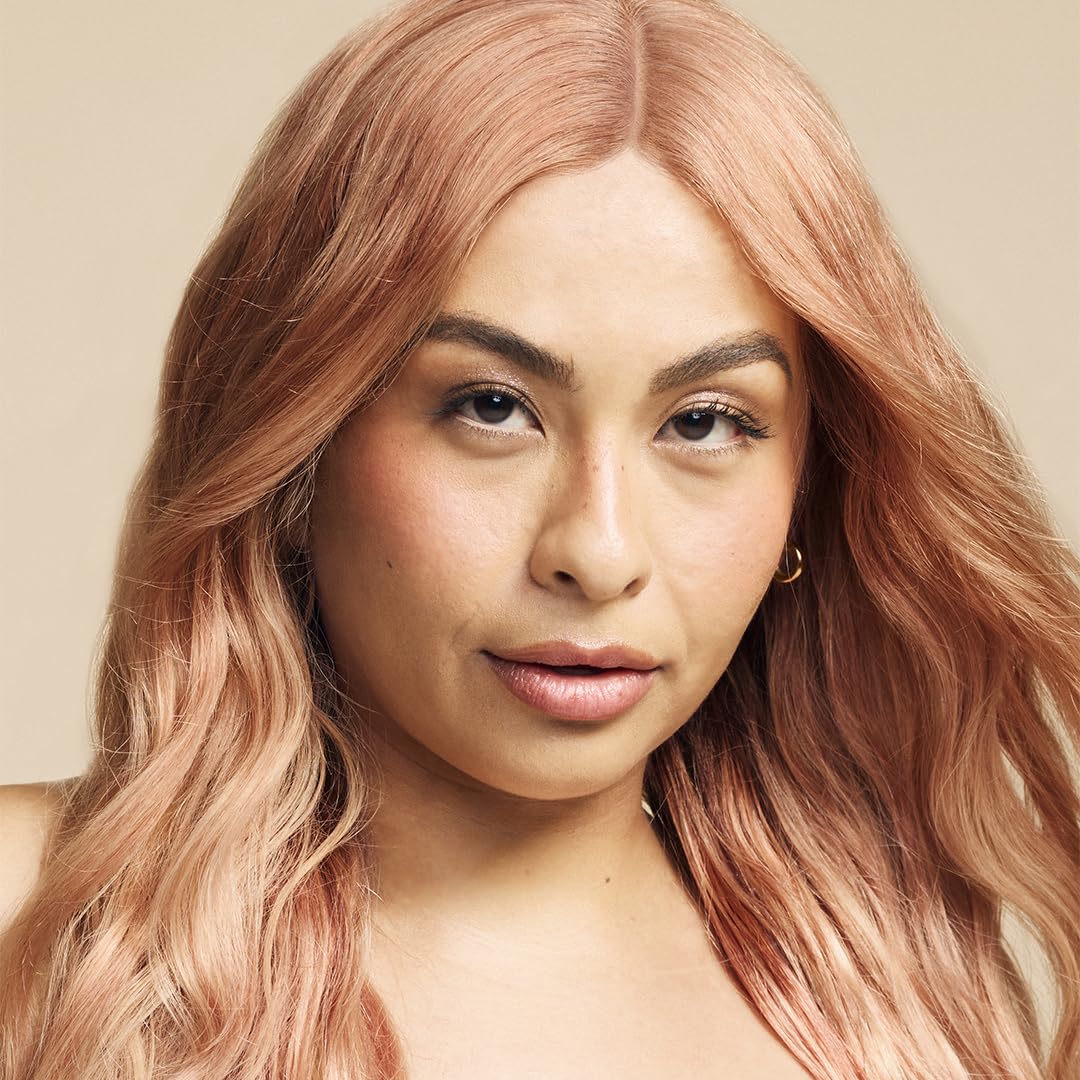 Close-up of ARCTIC FOX Apricot Anarchy hair dye texture in a bowl