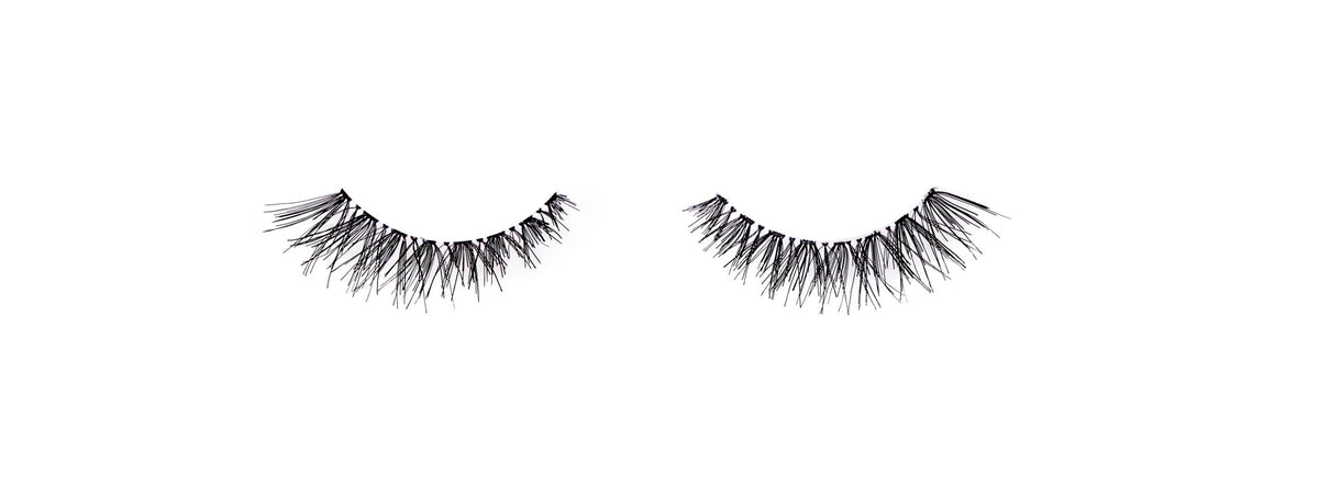 Close-up of Ardell Wispies 113 lashes on a tray