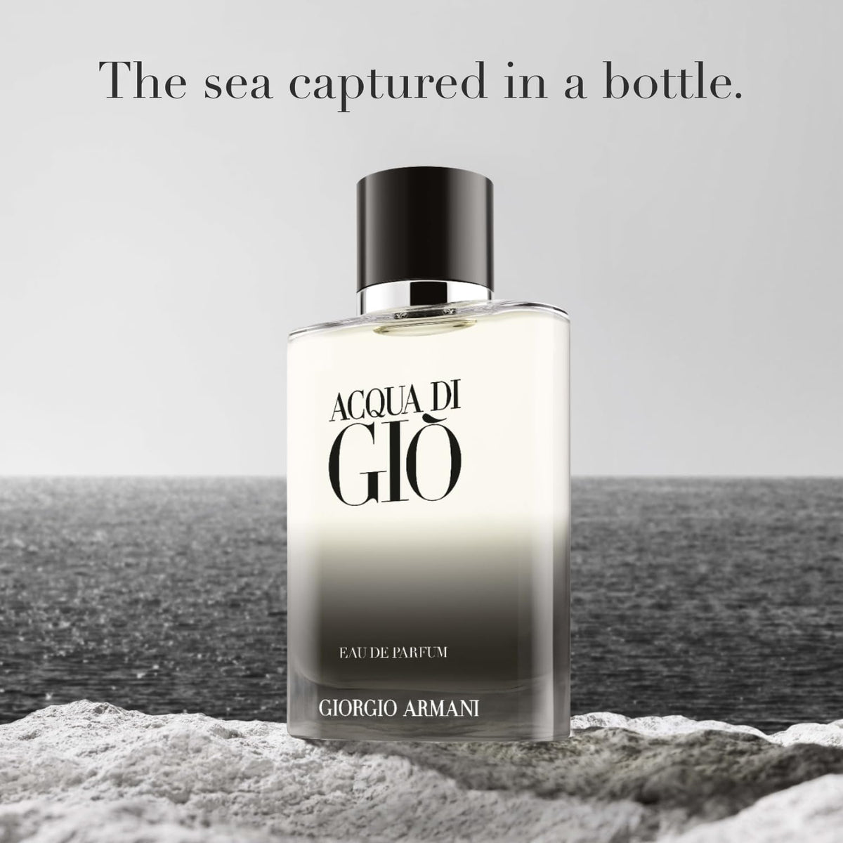 Close-up of Armani Beauty Acqua di Giò cap with monogram