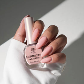 Close-up of AZUREBEAUTY Nude Pink Shimmer Nail Polish texture