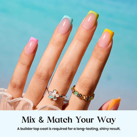 close-up of beetles press on nails with pink French tips