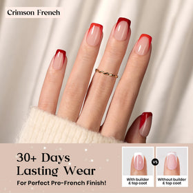 Close-up of Beetles Red Press On Nails with classic French tip design