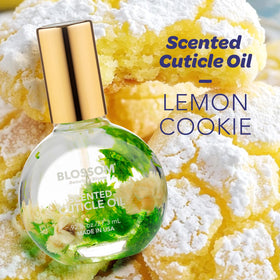 Close-up of Blossom Cuticle Oil bottle with floral design