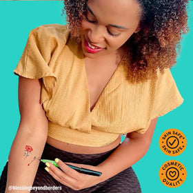 Close-up of BODYMARK Pride temporary tattoo markers in vibrant colours