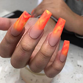 Close-up of BTArtbox clear fake nails showing natural finish