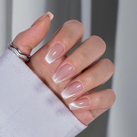 Close-up of BTArtbox Press On Nails with gel glue and tools