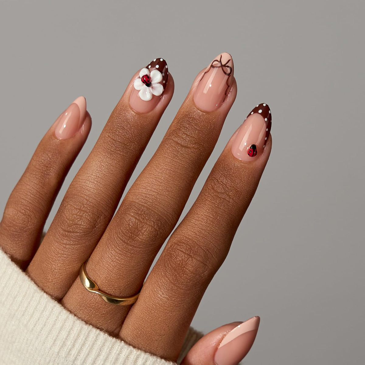 Close-up of BTARTBOXNAILS SkinTone French Tip design