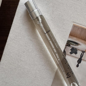 Close-up of By Rosie Jane Travel Perfume Spray (Lake) bottle