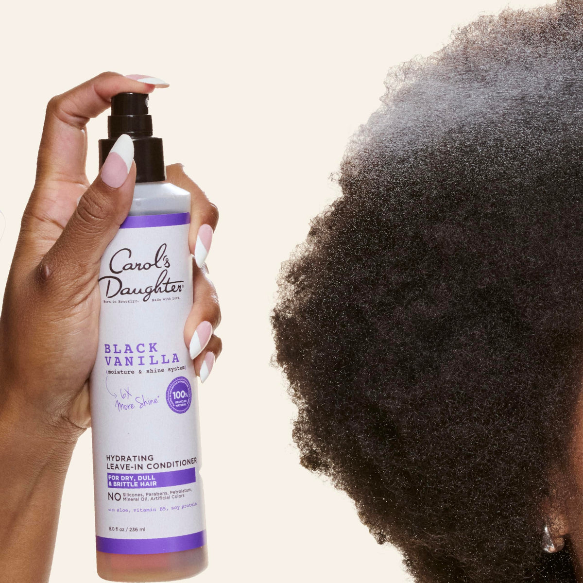 Close-up of Carol's Daughter Black Vanilla Leave In Conditioner spray nozzle