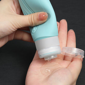 Close-up of CHEODIN travel bottle cap with flow-control hole