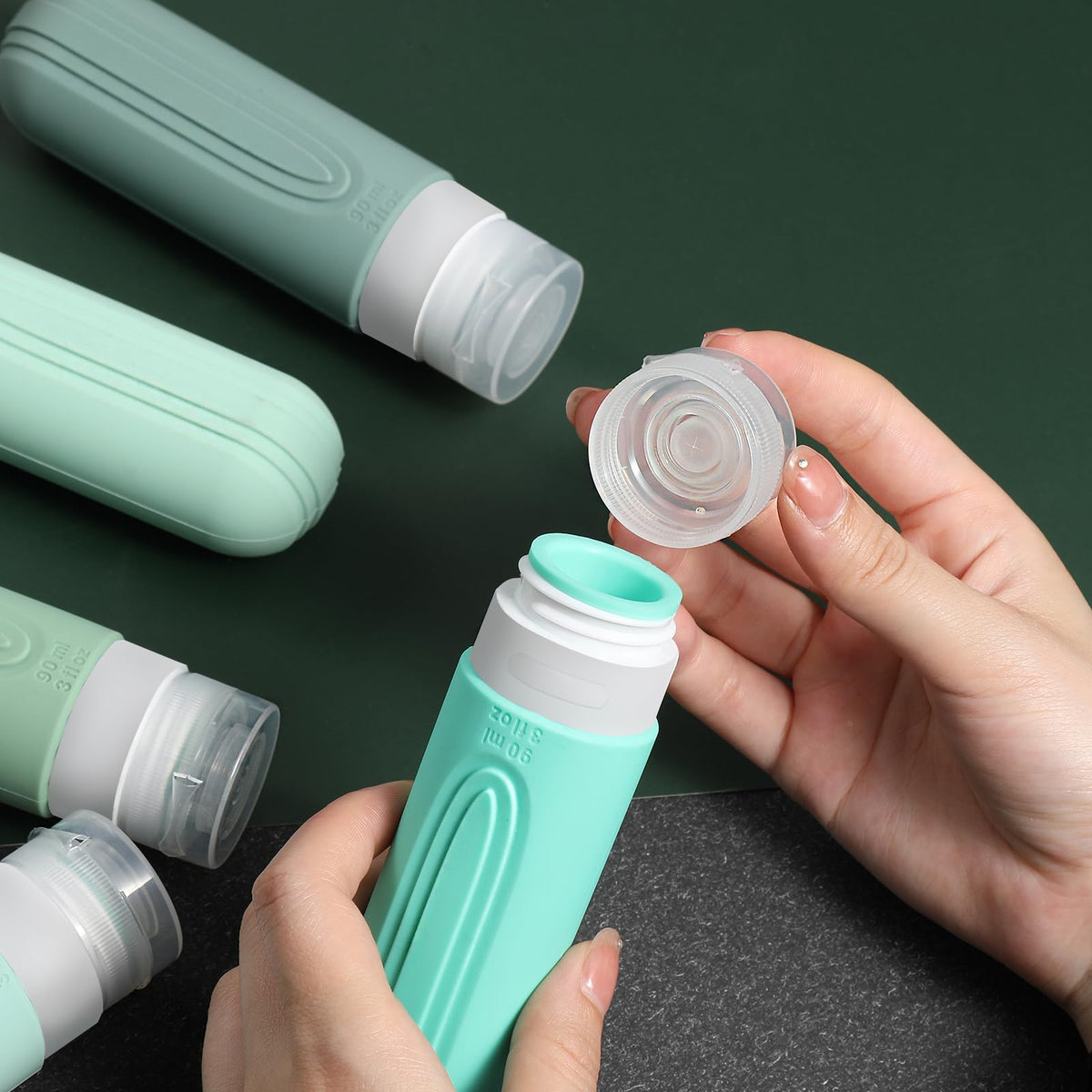 Close-up of CHEODIN travel bottle with cross-shaped flow-control hole
