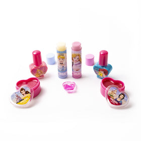 Close-up of Cinderella and Rapunzel lip balms in Lip Smacker tote