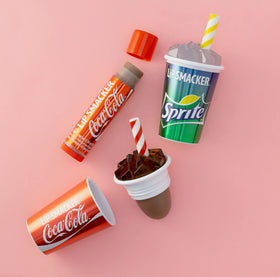 Close-up of Coca-Cola lip balm tube