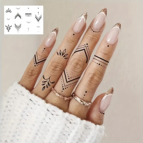 Close-up of COKTAK temporary tattoos showing lotus and butterfly designs