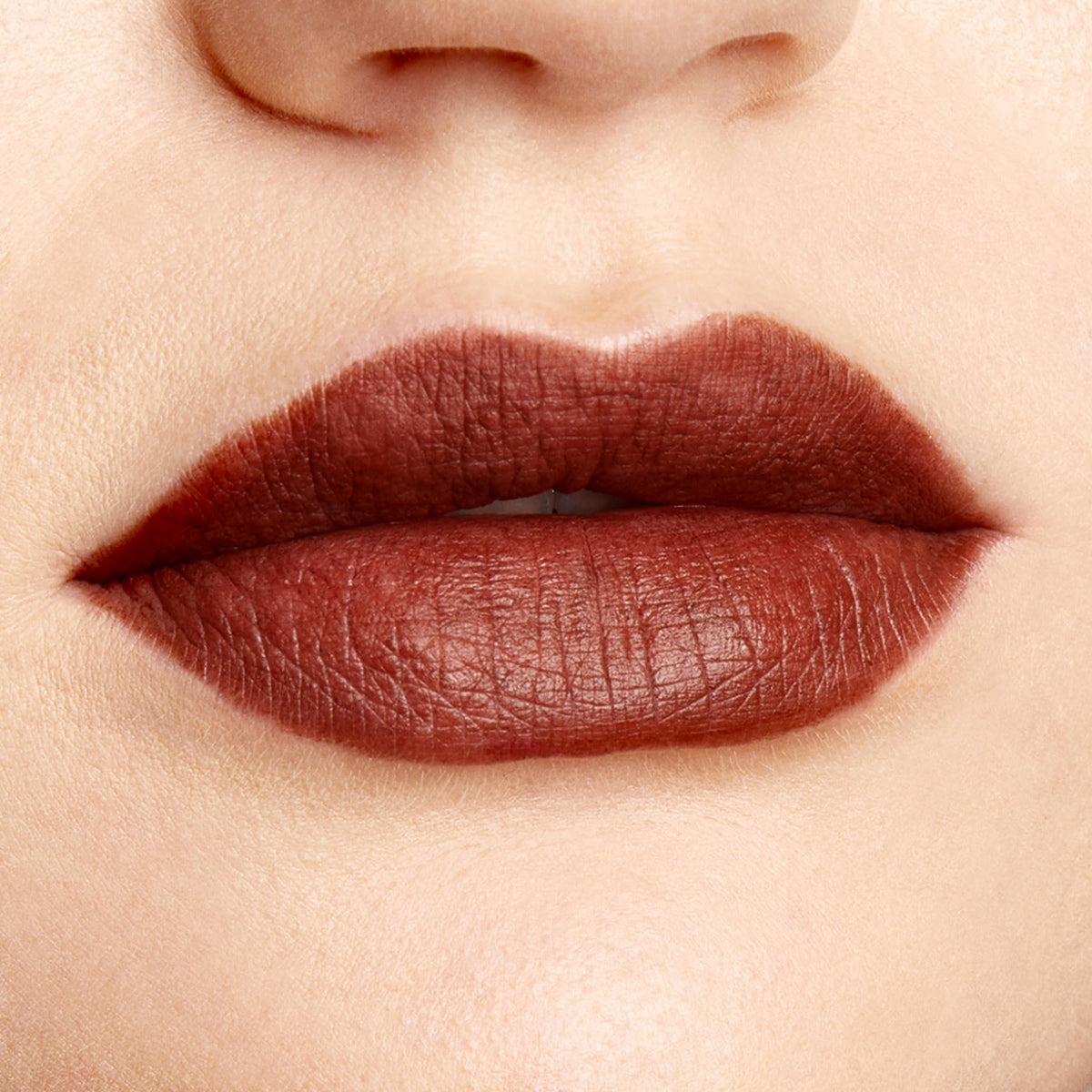 Close-up of ColourPop lip pencil in BFF3 deep nude shade
