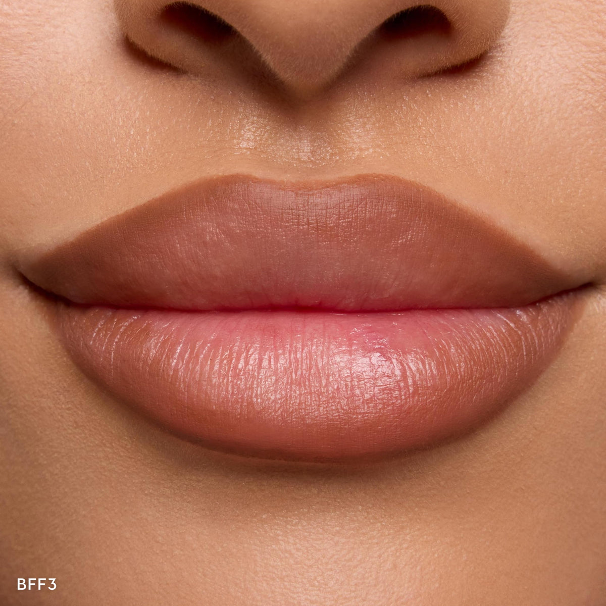 Close-up of ColourPop lip pencil in Chain Reaction warm chocolate shade