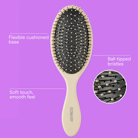 Close-up of Conair detangling brush with soft ball-tipped bristles