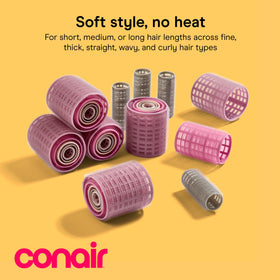 Close-up of Conair Heatless Curls Hair Rollers in pink, gray, and purple