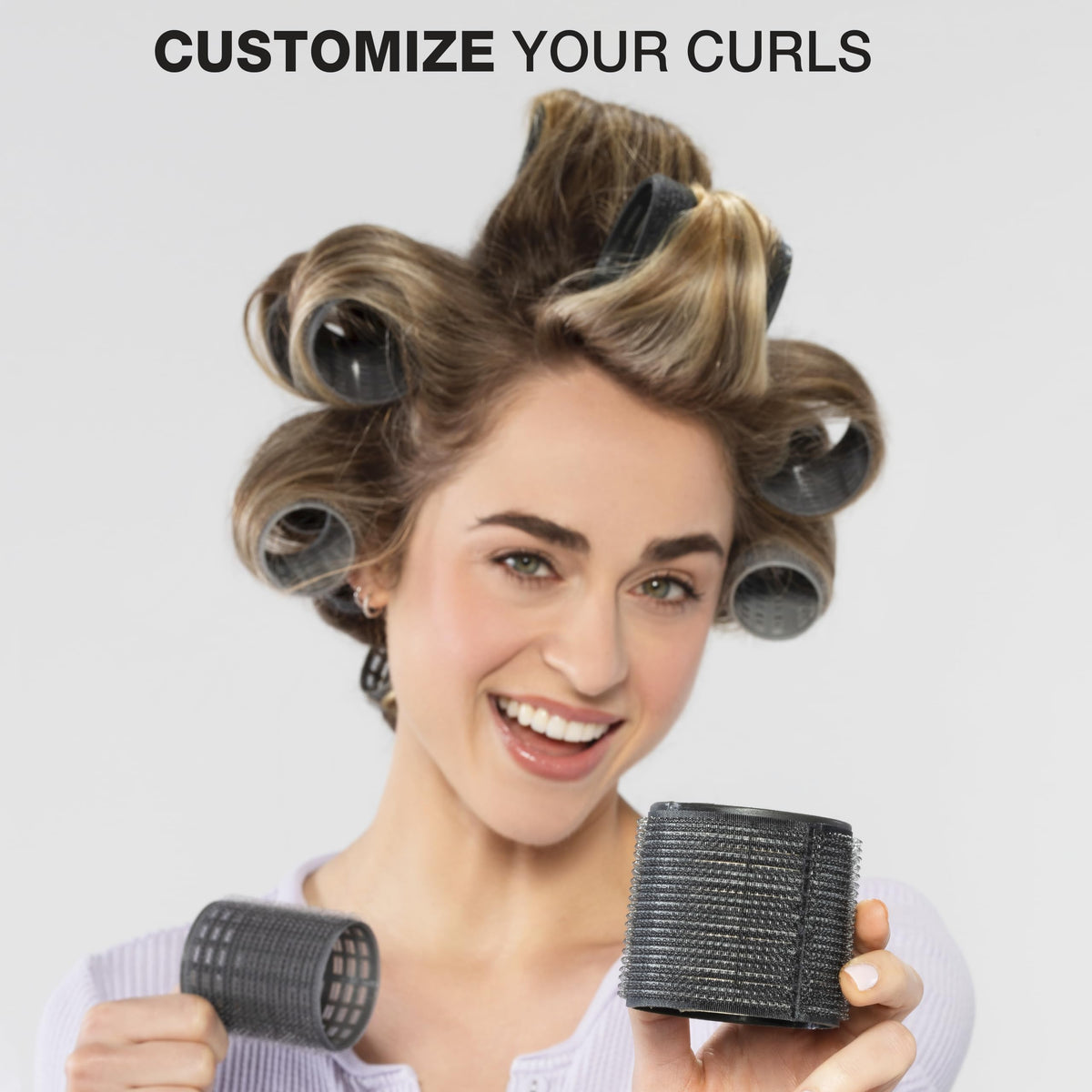 Close-up of Conair self-grip hair rollers in various sizes