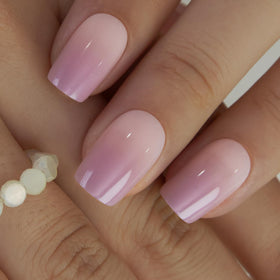 Close-up of CurvLife press on nails showing the rose fade colour