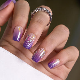 Close-up of CurvLife press on nails showing the violet lines design