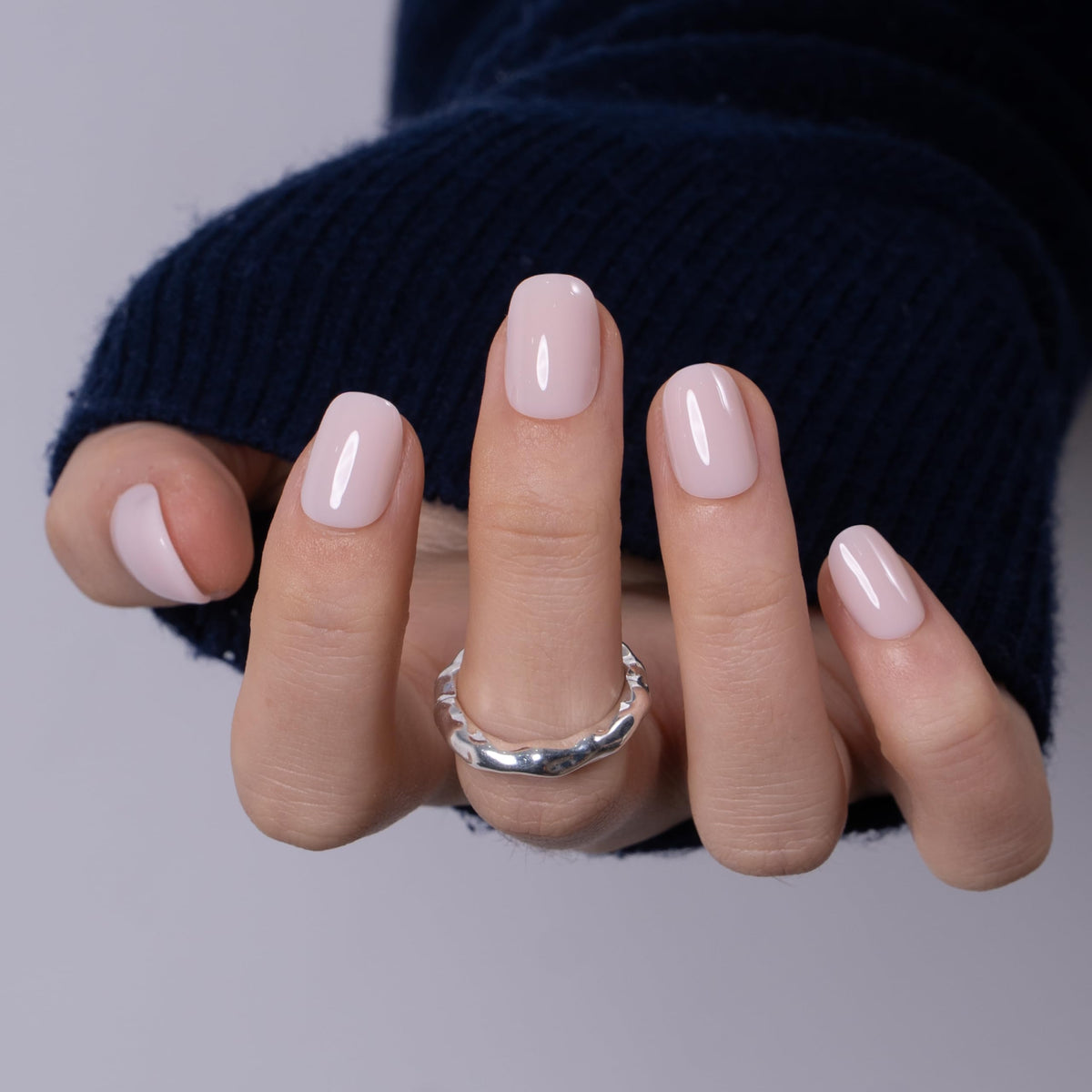 Close-up of CurvLife Short Square Press On Nails showing texture