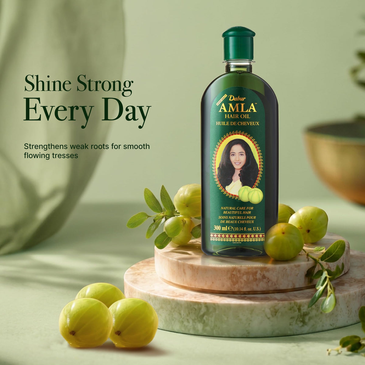 Close-up of Dabur Amla Hair Oil bottle with amla extract