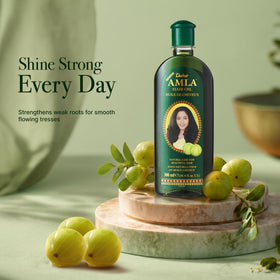 Close-up of Dabur Amla Hair Oil bottle with amla extract