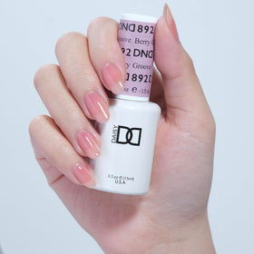 Close-up of DAISY DND Berry Groove #892 gel polish bottle