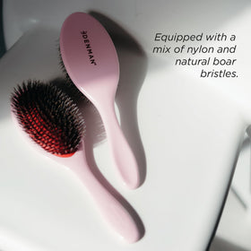 Close-up of Denman hairbrush bristles
