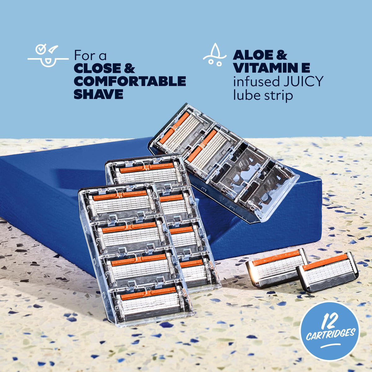 Close-up of Dollar Shave Club razor blade with lubricant strip