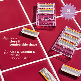 Close-up of Dollar Shave Club women's razor with Aloe and Vitamin E strip