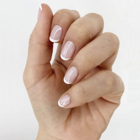 Close-up of essie Blanc pure white nail polish bottle