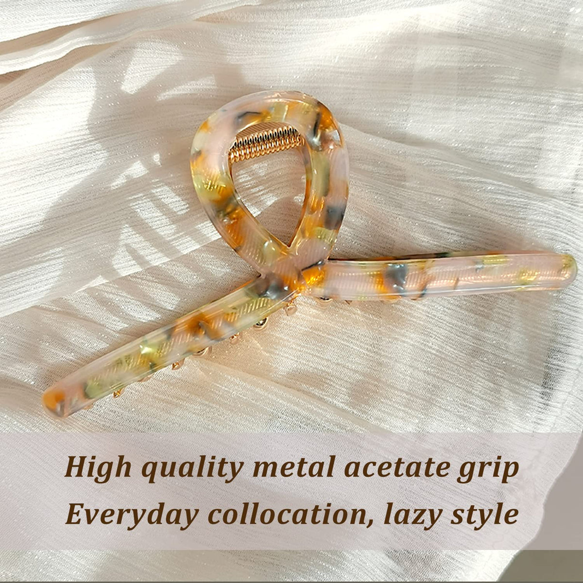 Close-up of FAELBATY hair claw clip showing strong spring mechanism